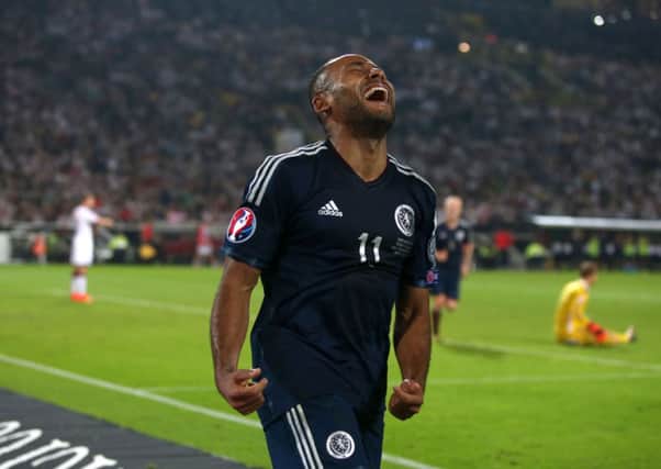 Scotland's Ikechi Anya celebrates scoring against Germany, the winger has emerged as a target for Celtic. Picture: PA