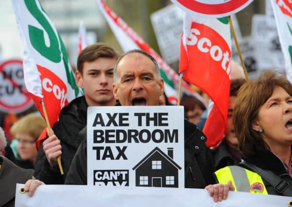 High profile figures like Tommy Sheridan were among the thousands who  protested against The Bedroom Tax last year. Picture: TSPL