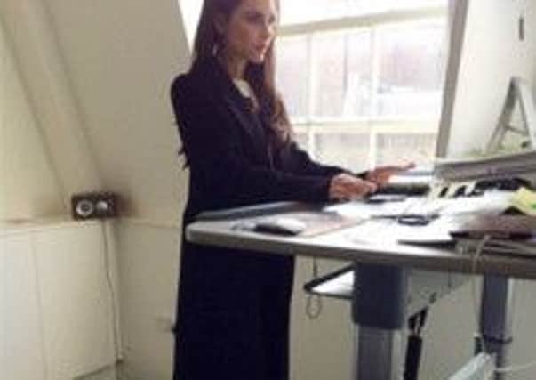 Even Victoria Beckham has tried out working at a desk while standing. Picture: Twitter