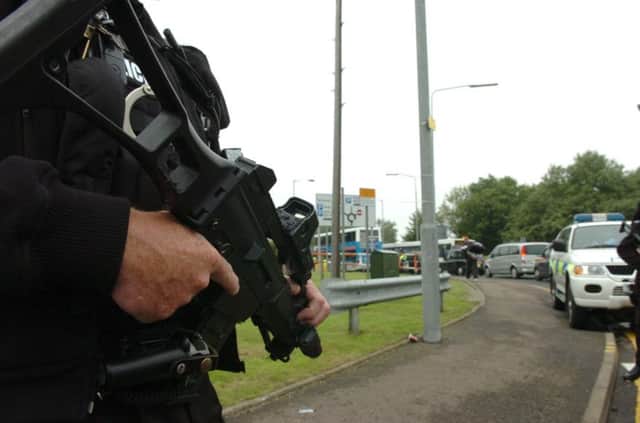 Police Scotland has repeatedly defended the need for some officers to carry guns. Picture: Dan Phillips