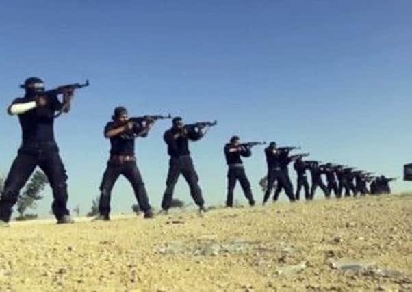 Stills from a video made by Syrias Islamist Ahrar al-Sham group shows its members training. Picture: AFP