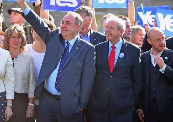 First Minister Alex Salmond and former SNP deputy leader Jim Sillars. Picture: Getty