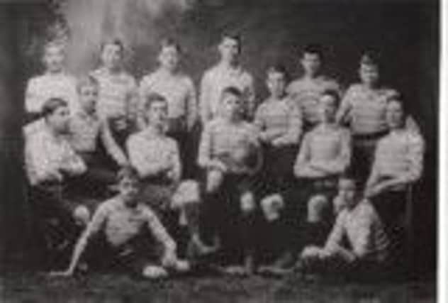 Ronald Simson, holding the ball, as a member of the Edinburgh Academy fourth XV rugby team of 1904-1905