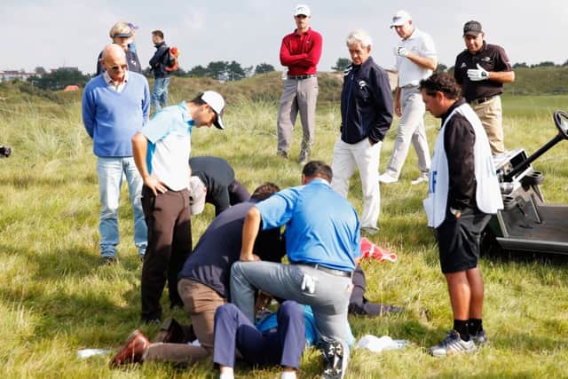 Fabrizio Zanotti of Paraguay is attended to by medical staff at the KLM Open yesterday. Picture: Getty