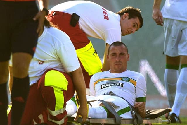 Celtic captain Scott Brown has been out since this injury in July. Picture: SNS
