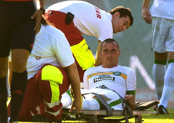 Celtic captain Scott Brown has been out since this injury in July. Picture: SNS