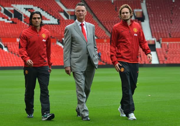Radamel Falcao and Daley Blind flank manager Louis van Gaal. Picture: Getty