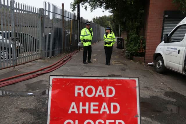 Emergency services at the scene at Manchester Dogs Home, Manchester, after a blaze killed more than 50 dogs. Picture: PA