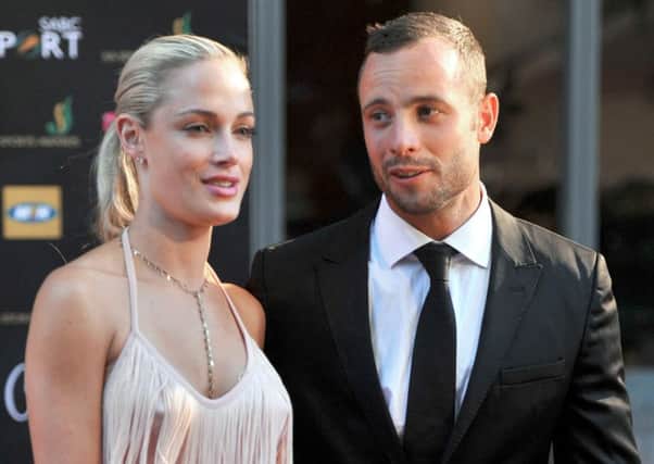 Oscar Pistorius and his model girlfriend Reeva Steenkamp. Picture: Getty