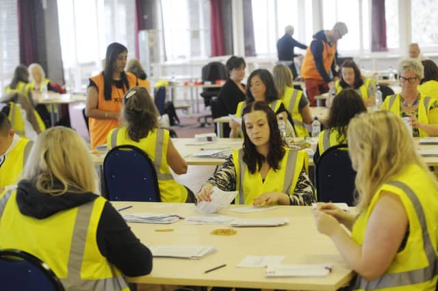 The postal votes are opened and organised for the independence referendum. Picture: Greg Macvean