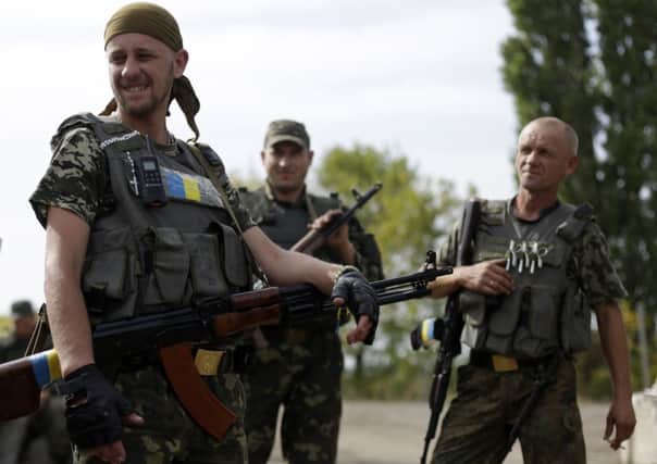 Ukrainian soldiers near the eastern city of Popasna yesterday. Picture: Getty