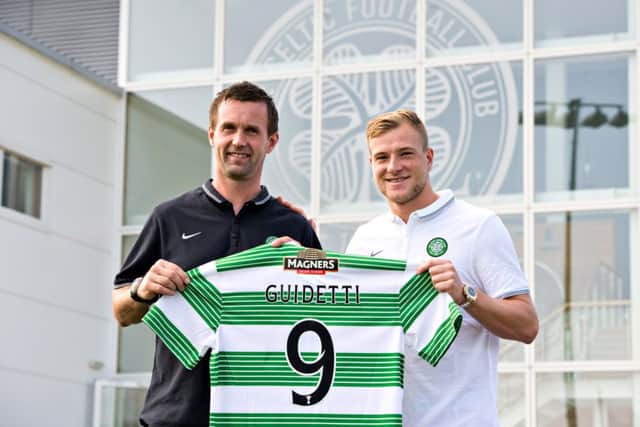 Celtic boss Ronny Deila, left, may hand John Guidetti debut against Aberdeen. Picture: SNS