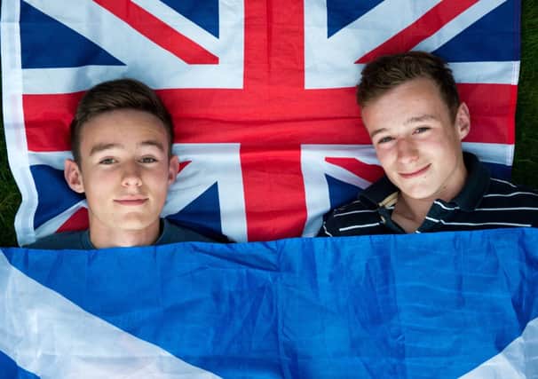 Cameron Brown (left) and his twin brother Thomas are set to vote for the first time on Thursday. Picture: Alex Hewitt