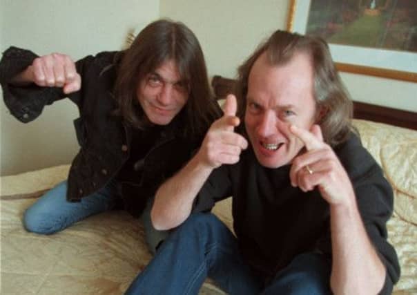 Malcolm, left, and Angus Young on tour. Picture: Getty