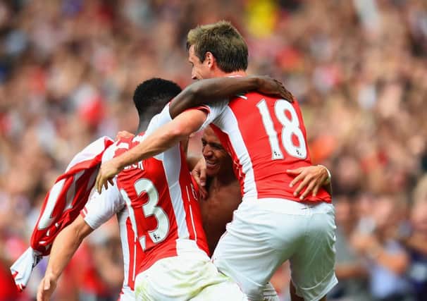 Alexis Sanchez celebrates scoring their second goal with team mates. Picture: Getty