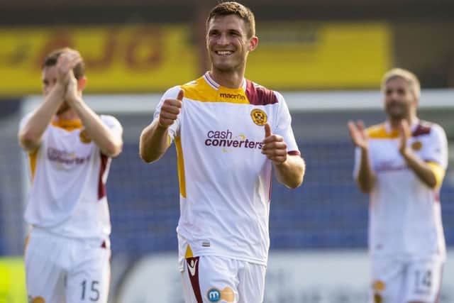 All smiles from Motherwell striker John Sutton at full-time. Picture: SNS