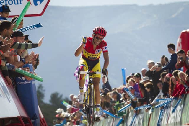 Alberto Contador celebrates as he crosses the finish line. Picture: Getty