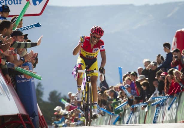 Alberto Contador celebrates as he crosses the finish line. Picture: Getty