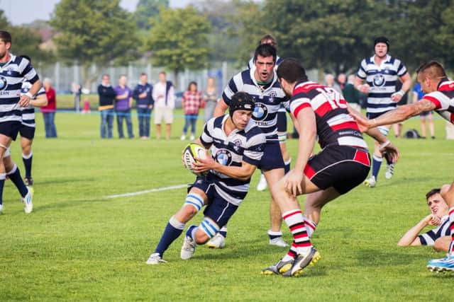 Heriots back row Chris Mulligan attempts to get past Stirlings Danny Gilmour at Goldenacre. Picture: Malcolm McCurrach