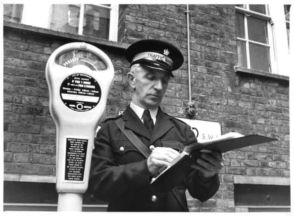 One of Britains first traffic wardens starts work in London on this day in 1960. Picture: Getty