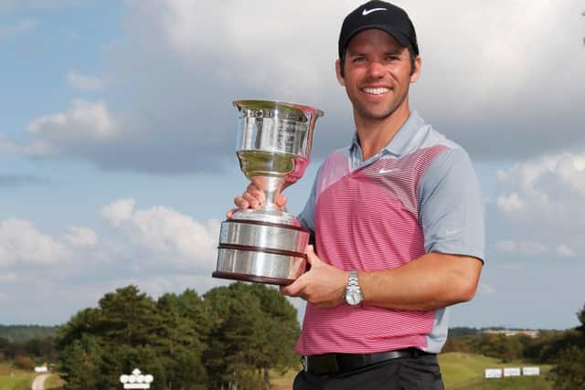 Paul Casey celebrates with the trophy after his success in the KLM Open yesterday. Picture: Getty