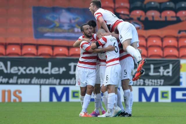 Hamilton Accies players celebrate Tony Andreus goal which put his side 21 up. Picture: Rob Casey/SNS
