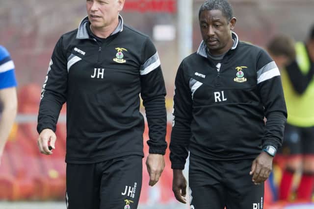 John Hughes and assistant Russell Latapy after the Firhill setback. Picture: SNS