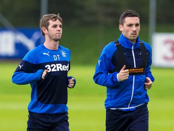 David Templeton, left, and Nicky Clark limber up in training in preparation for tonights League Cup clash. Picture: SNS