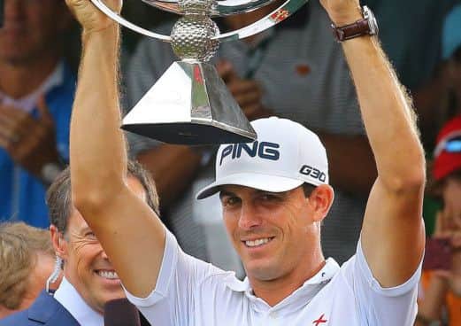 Billy Horschel lifts the FedEx Cup trophy after winning the Tour Championship tournament by three strokes on Sunday. Picture: AP