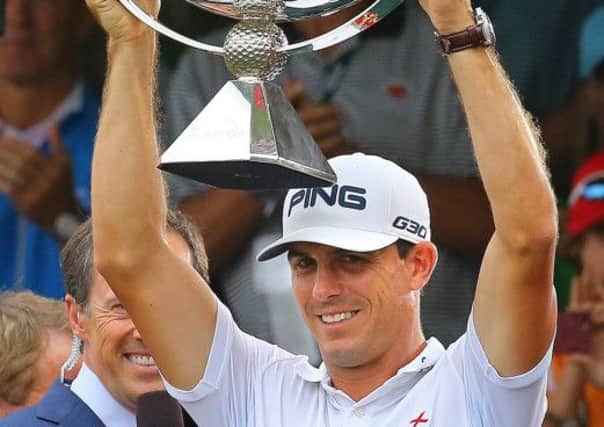 Billy Horschel lifts the FedEx Cup trophy after winning the Tour Championship tournament by three strokes on Sunday. Picture: AP