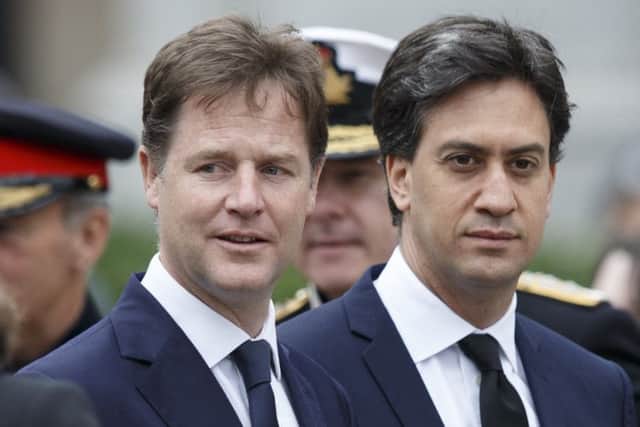 Nick Clegg and David Miliband joined David Cameron in signing the pledge. Picture: Robert Perry
