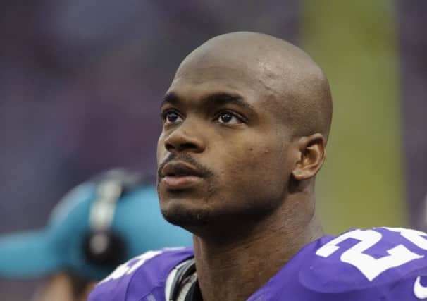 NFL star Adrian Peterson is facing charges for child abuse, but will return to play for Minnesota Vikings this weekend. Picture: Getty