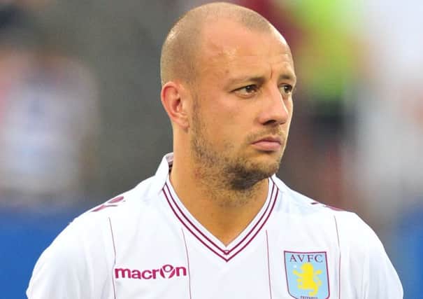 Alan Hutton: kept his head down. Picture: Getty