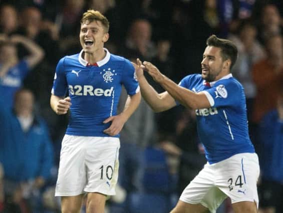 Lewis MacLeod, with Darren McGregor (right), celebrates the winning goal. Picture: PA