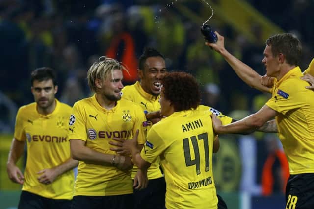 Borussia Dortmunds players celebrate at the final whistle after beating Arsenal. Picture: Reuters