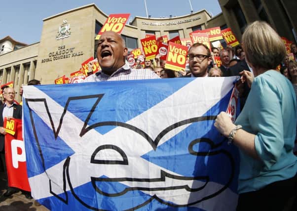 Yes and No supporters clash at an event in Glasgow. Picture: PA