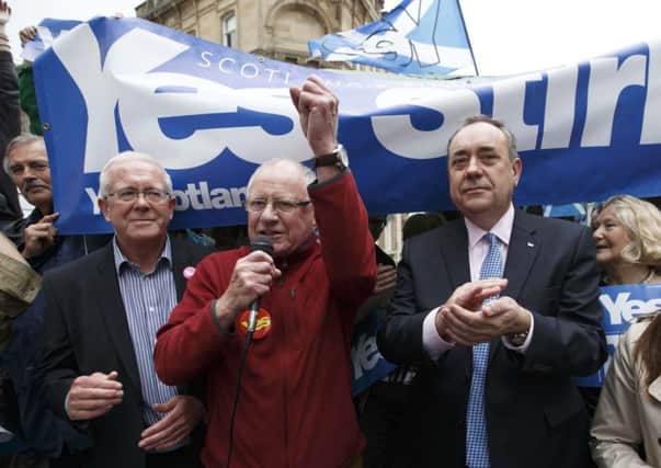 First Minister Alex Salmond and Dennis Canavan on the campaign trail in Stirling.  Picture: Robert Perry
