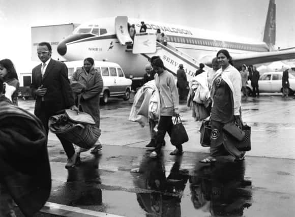 On this day in 1972 the first group of Ugandan Asians expelled by dictator Idi Amin arrived by plane in Britain. Picture: Getty