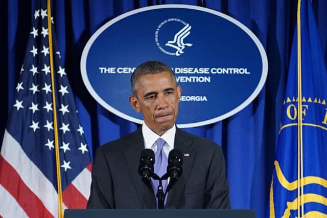 President Obama looked grim as he warned of security concerns. Picture: Getty