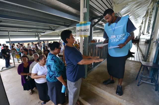 Fijians queue up to vote at the Vatuwaqa Public School in the capital Suva. Picture: Getty