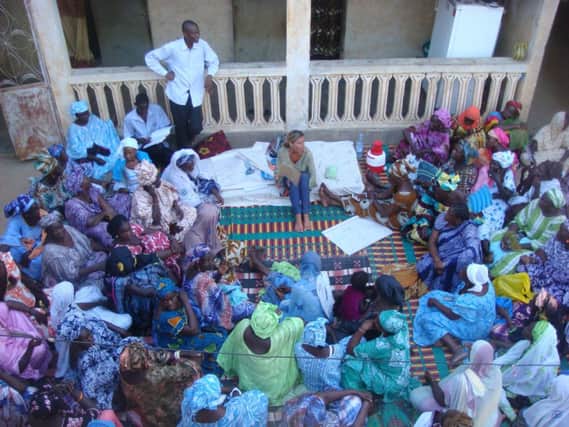 May East of CIFAL with villagers in northern Senegal at the launch of a three-year project to make food more efficiently