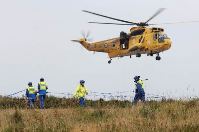 A private helicopter crashed down the cliffs at Flamborough Head, East Yorkshire, killing two people. Picture: SWNS