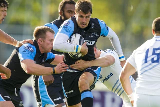 Peter Murchie drives the ball forward during Glasgows home win against defending champions Leinster. Picture: SNS