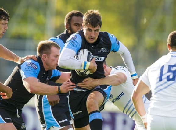 Peter Murchie drives the ball forward during Glasgows home win against defending champions Leinster. Picture: SNS