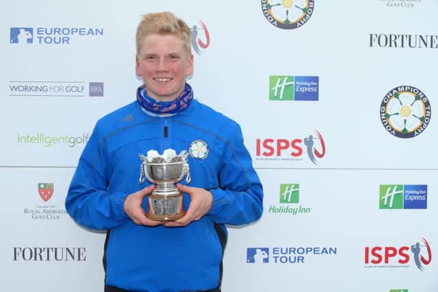 Iceland's Gisli Sveinbergsson with the trophy after winning the 2014 Duke of York Young Champions Trophy at Royal Aberdeen