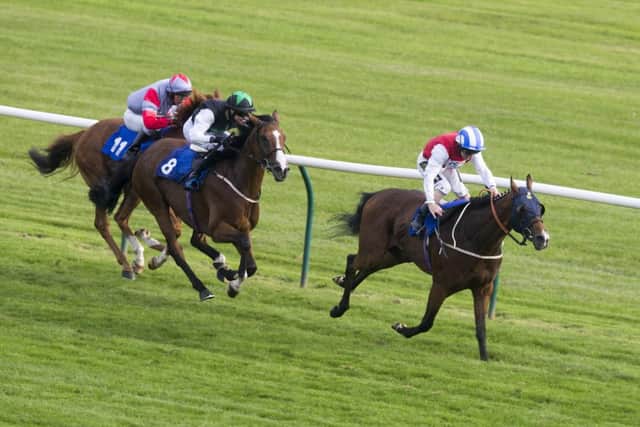The Mark Johnstontrained Fire Fighting, ridden by Joe Fanning, wins the William Hill Handicap Stakes. Picture: PA