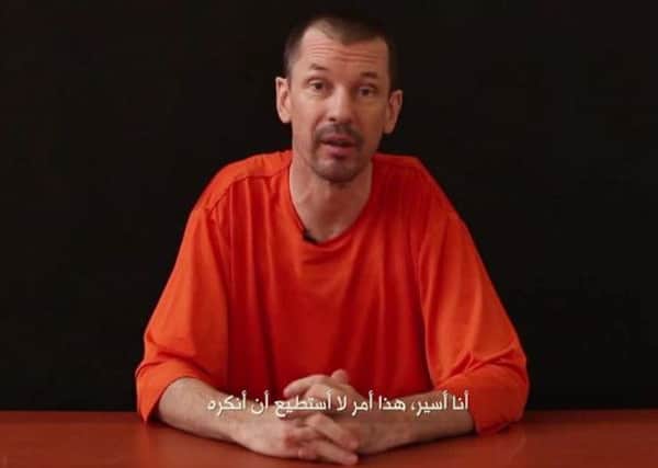 Captive British journalist John Cantlie hints this video is one of a series. Pic: AP