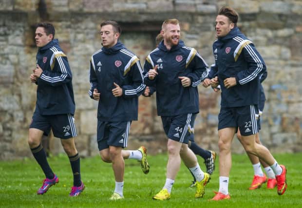 Adam Eckersley, centre, has been thrown in at the deep end at Hearts. Picture: SNS