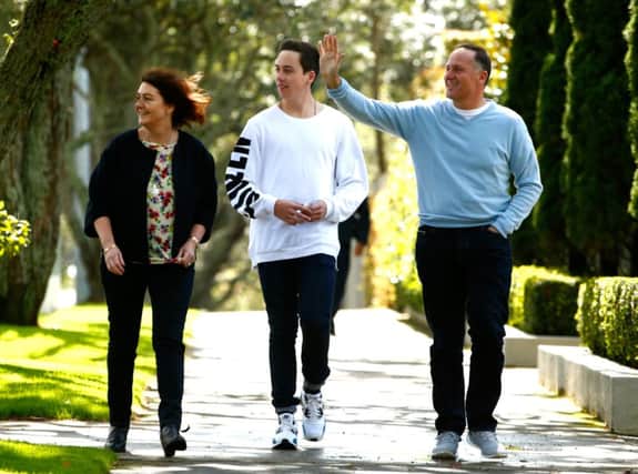 John Key with his wife Bronagh and son Max go to vote in Auckland. Picture: Getty