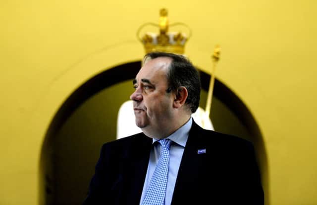 Alex Salmond in front of regalia belonging to the statue of George III. Picture: Jane Barlow